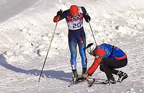 Canada coach helps Russian skiier