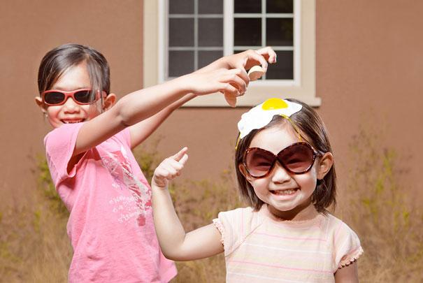 dad takes fun pictures of daughters