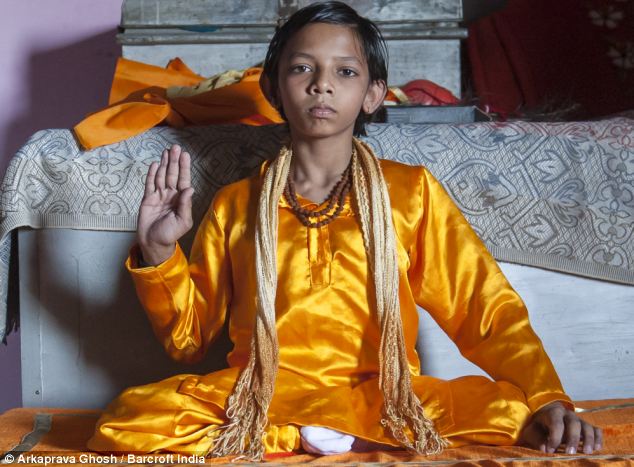 indian kid with tail worshipped
