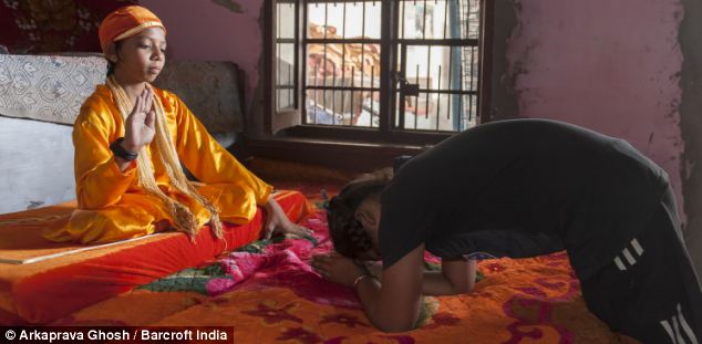 indian kid with tail worshipped