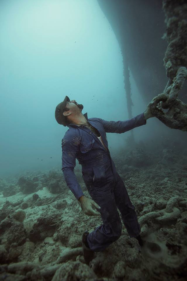 underwater photo shoot construction worker