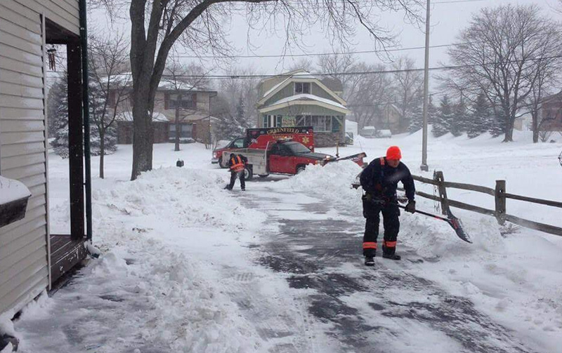 paramedics shovel elderly mans driveway