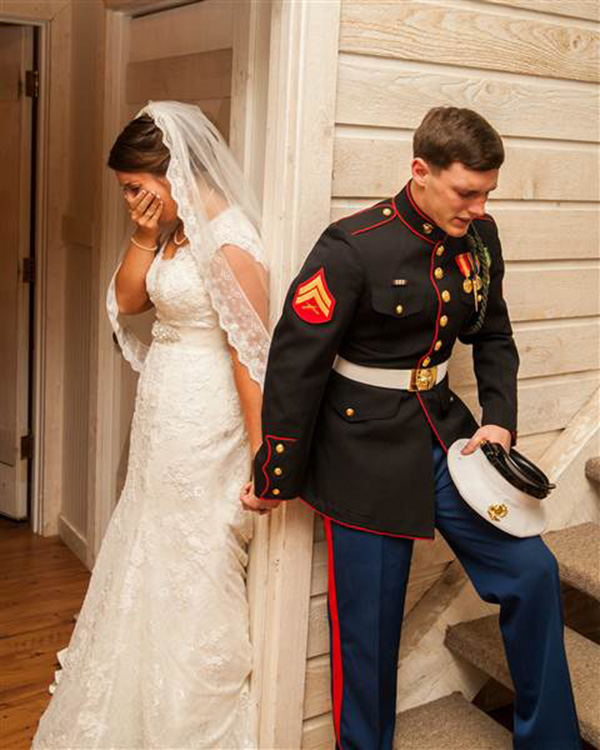 marine and bride praying