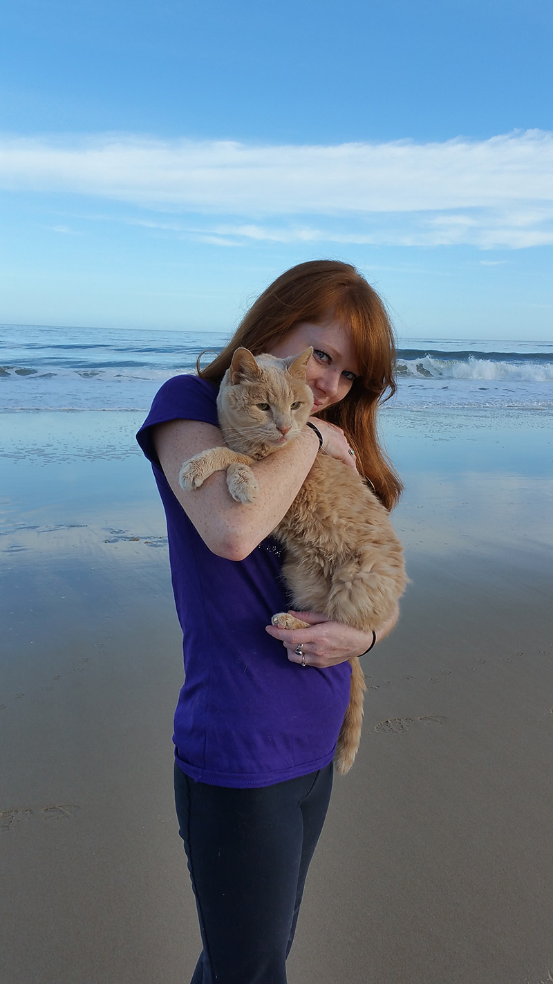 woman takes senior cat on bucket list adventures
