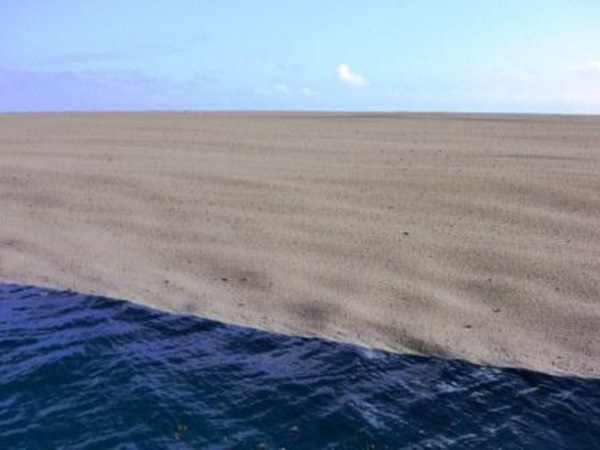 sandbar middle of ocean island creation