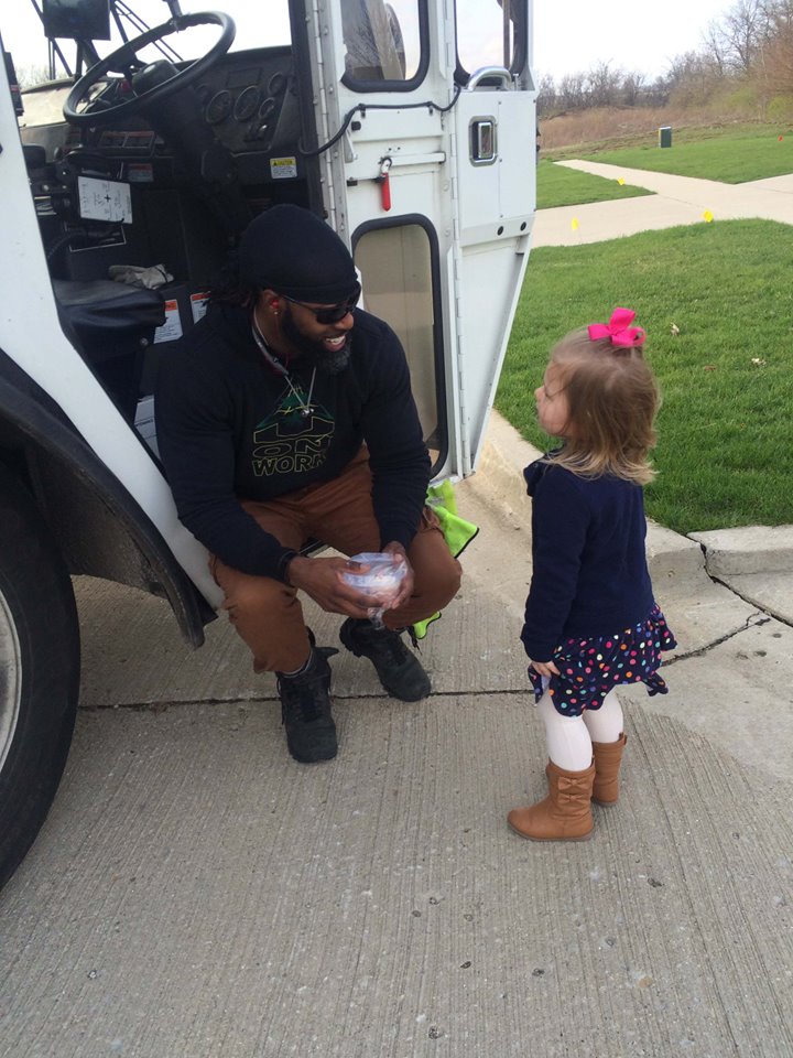 little girl meets garbage man