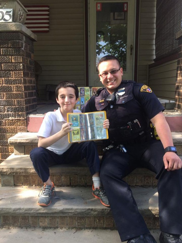 cop brings kid his Pokemon collection after stolen