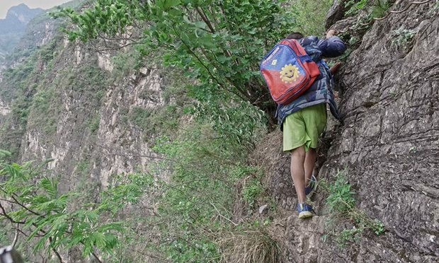 chinese students climb mountain to get to school
