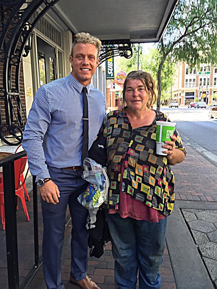 man teaches homeless woman to read