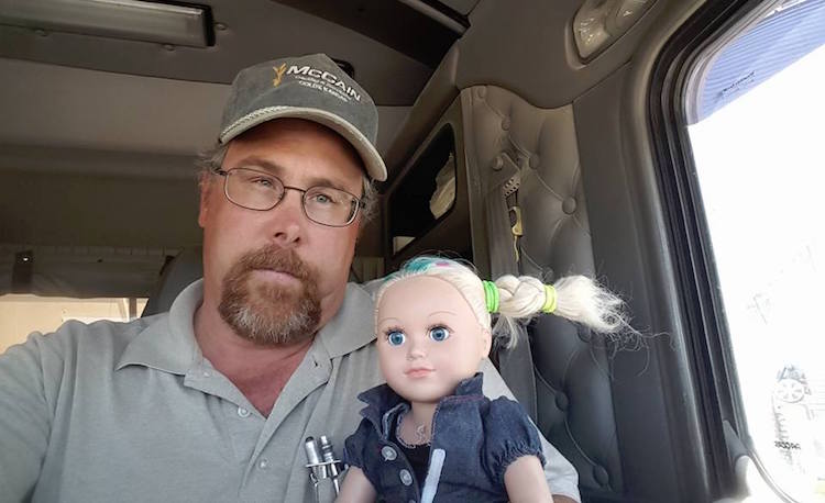 trucker babysits doll