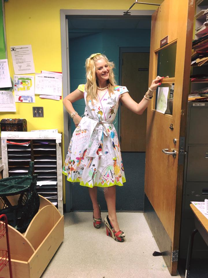 teacher wears dress decorated by students