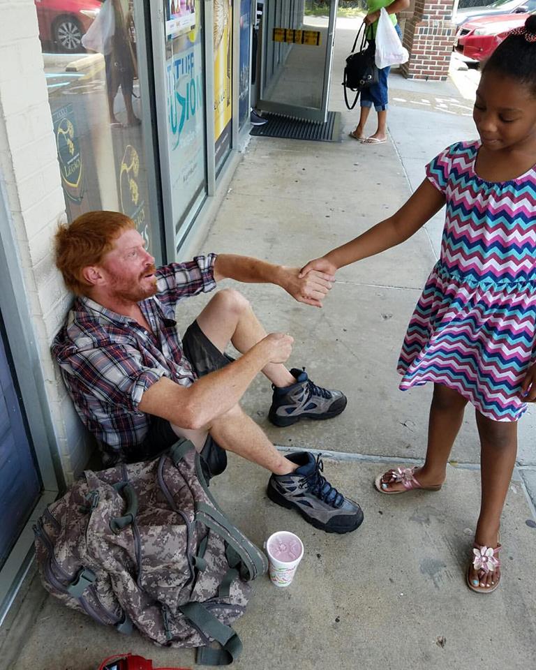 little girl homeless blind man