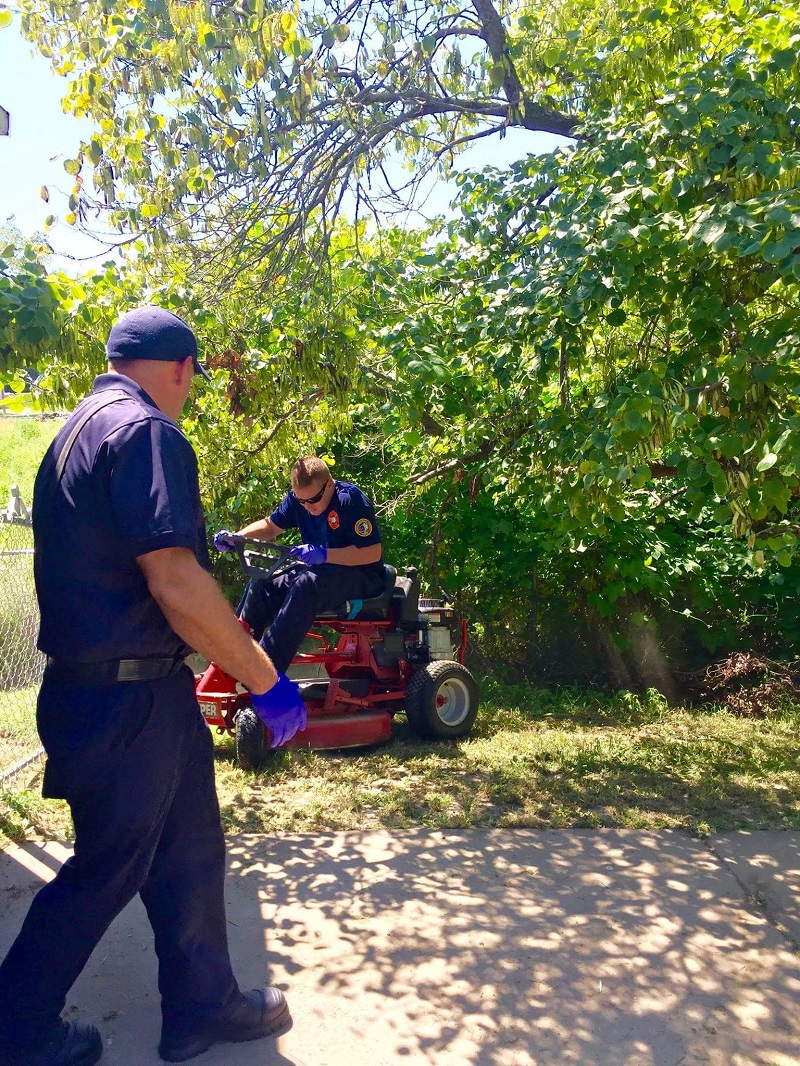 first responders stay to cut grass
