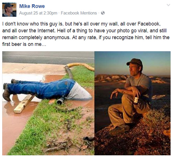 man diving waist deep in mud for work