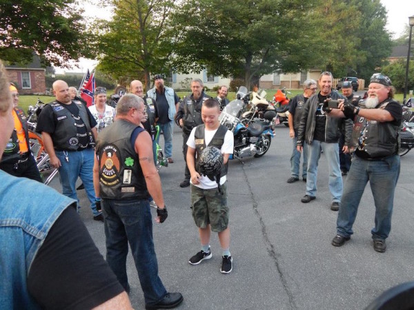 bikers escort boy with Down Syndrome to school
