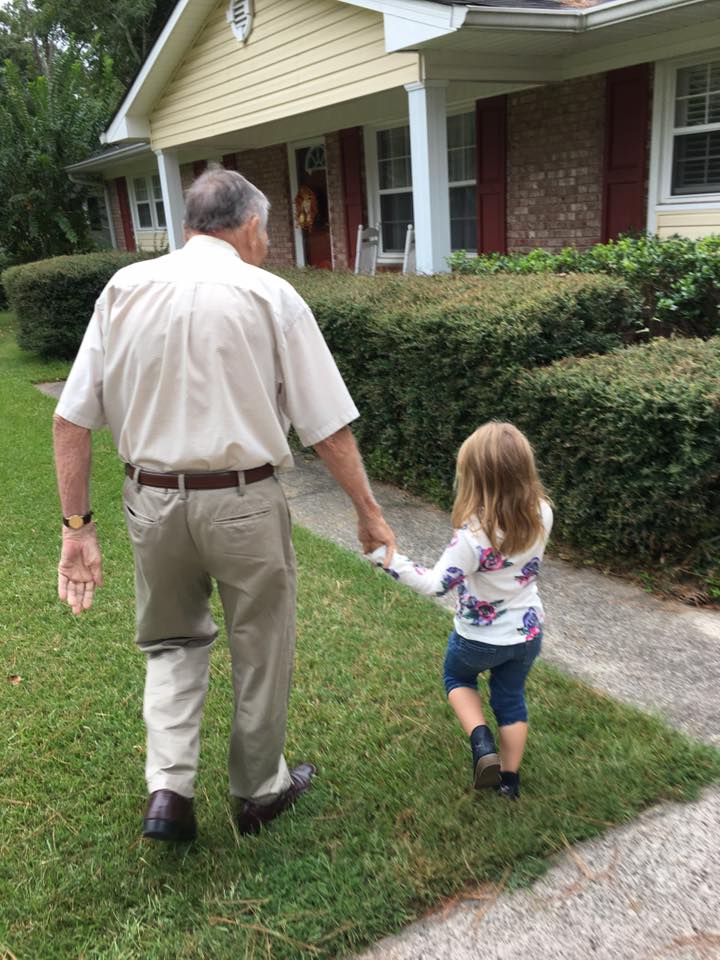 little girl helps old man good news