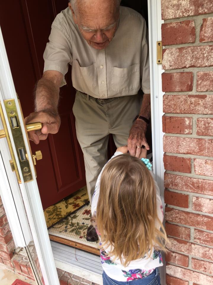 little girl helps old man good news