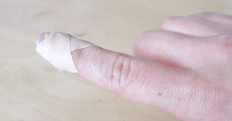 brilliant way to put band aid on finger tip