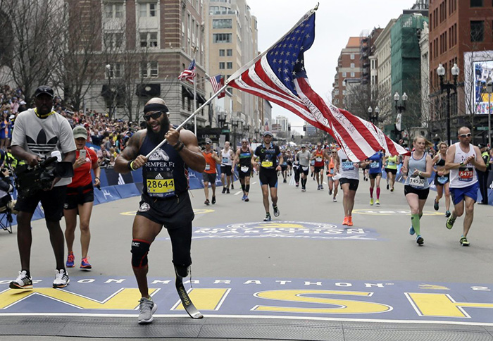 Boston marathon runner American flag one leg