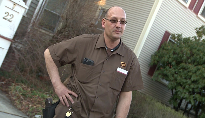 UPS driver puts out house fire saves people inside