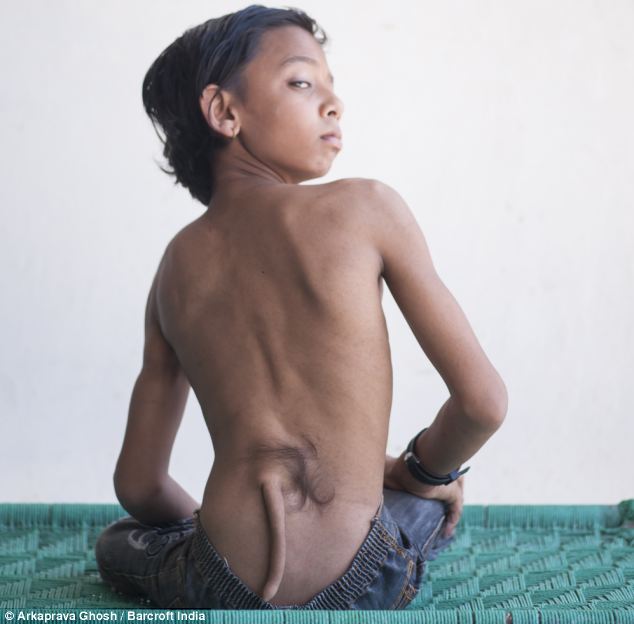 indian kid with tail worshipped