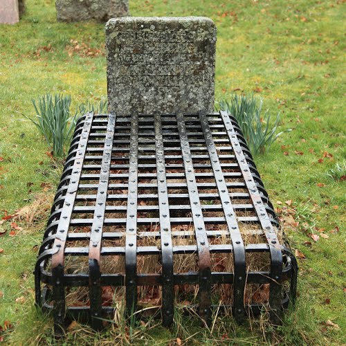 cage over grave