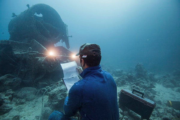 underwater photo shoot construction worker