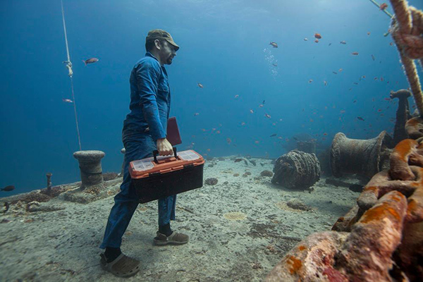 underwater photo shoot construction worker