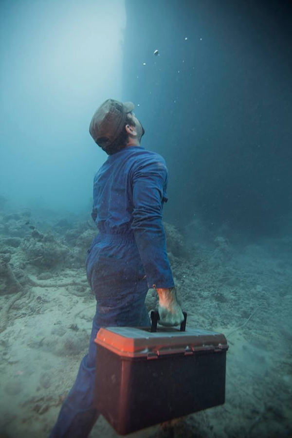 underwater photo shoot construction worker