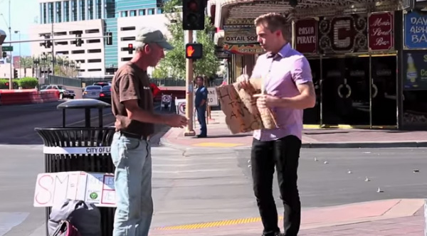 man rips up homeless veterans sign