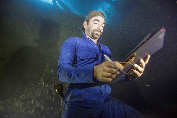 underwater photo shoot construction worker