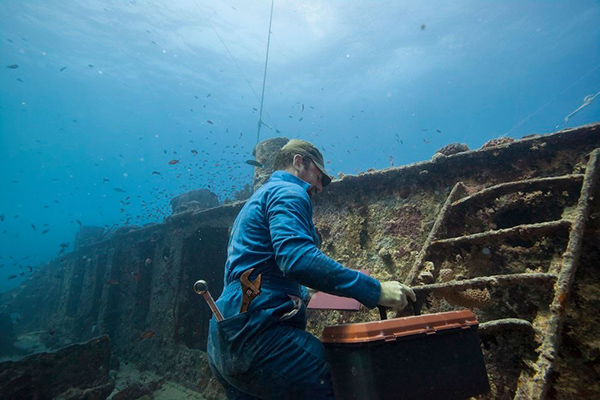 underwater photo shoot construction worker