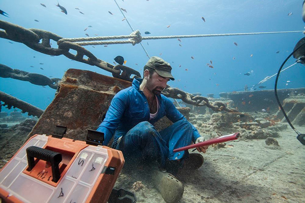 underwater photo shoot construction worker