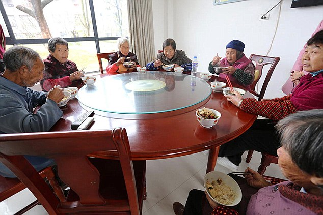 Chinese millionaire buys homes for poor