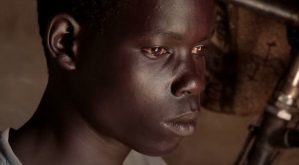 deaf Uganda boy sign language teacher arrives