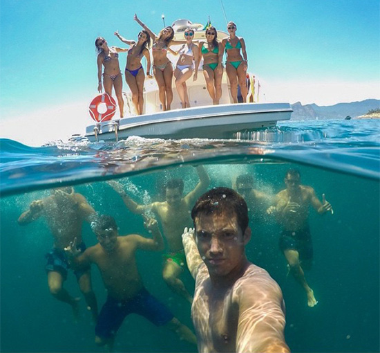 boat group selfie under water
