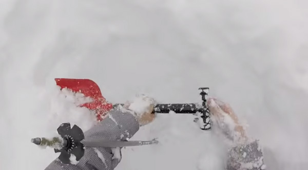skier saved from avalanche video