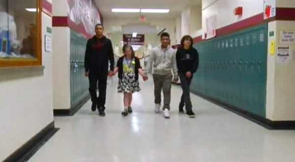 boys stop game to help bullied cheerleader