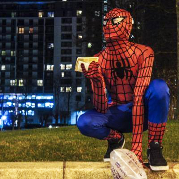 spiderman feeding homeless people