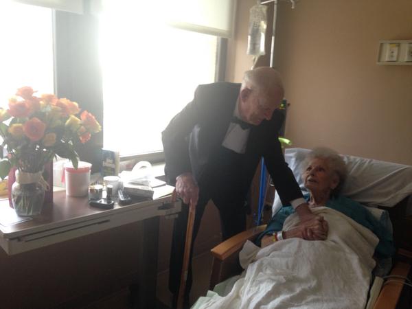 man surprises wife in hospital on anniversary tuxedo