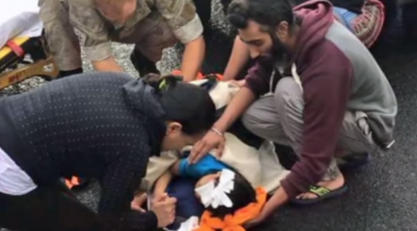 sikh man helps child removes turban