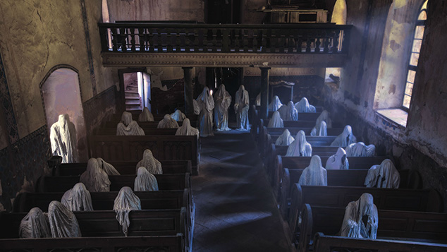 7)  An abandoned church with a few lingering parishioners – Czech Republic