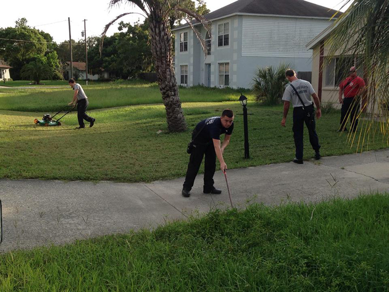 firefighters finish lawn heart attack