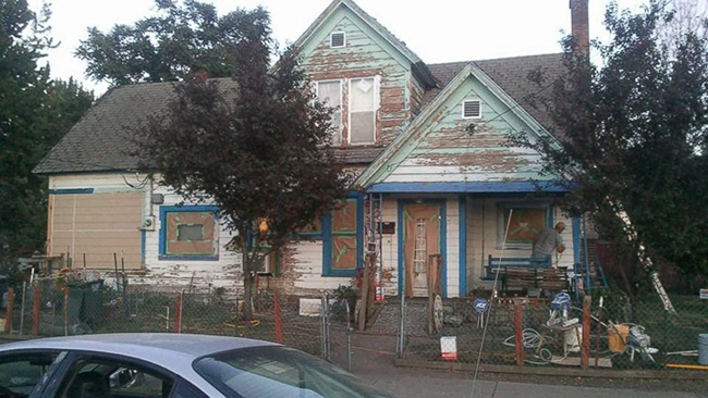 volunteers paint old mans house