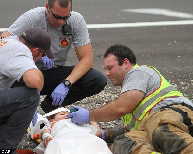 firefighter shows kid happy feet after accident