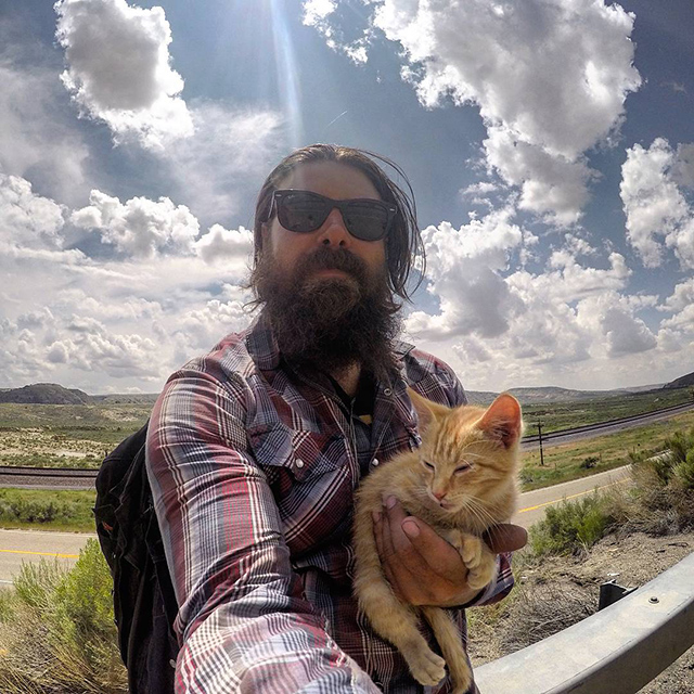 biker takes kitten on road trip