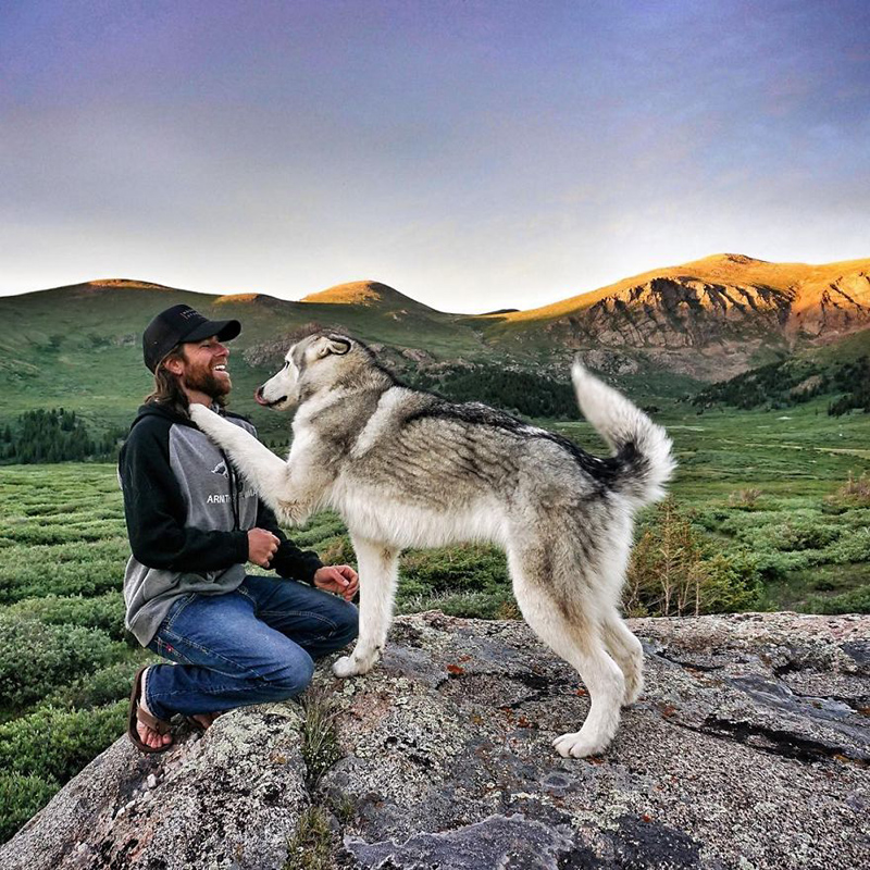 man takes dog on epic adventures