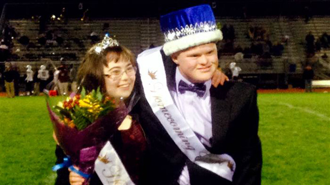 homecoming king leads chant