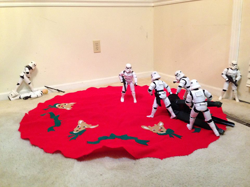 storm troopers put up Christmas tree