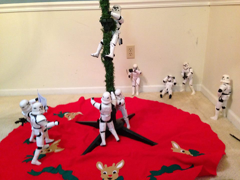 storm troopers put up Christmas tree